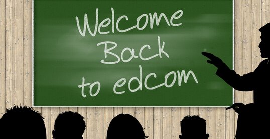 Schriftzug welcome back to edcom