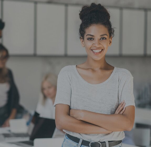 woman looks into camera it jobs timetoact group