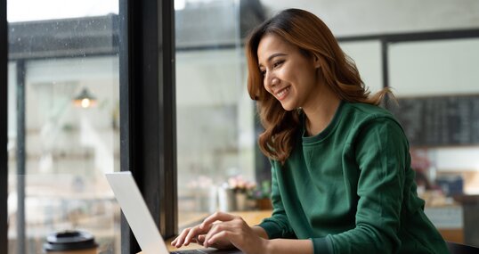 Asian woman working with laptop