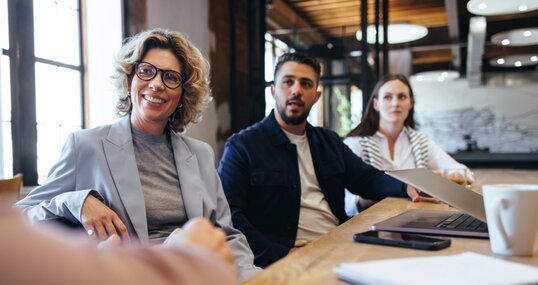 Creative business people having a meeting over a project