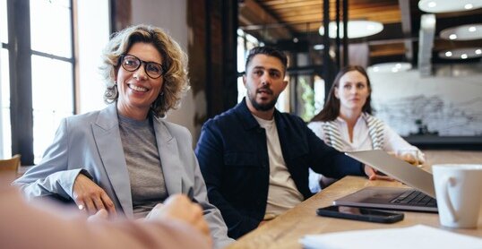 Creative business people having a meeting over a project