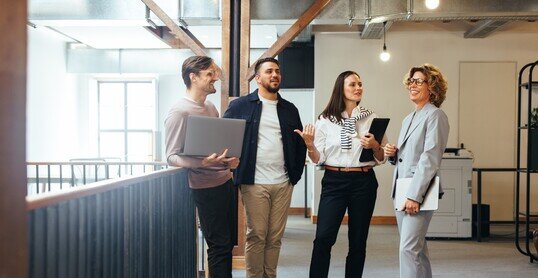 Professionals having a team meeting in an office